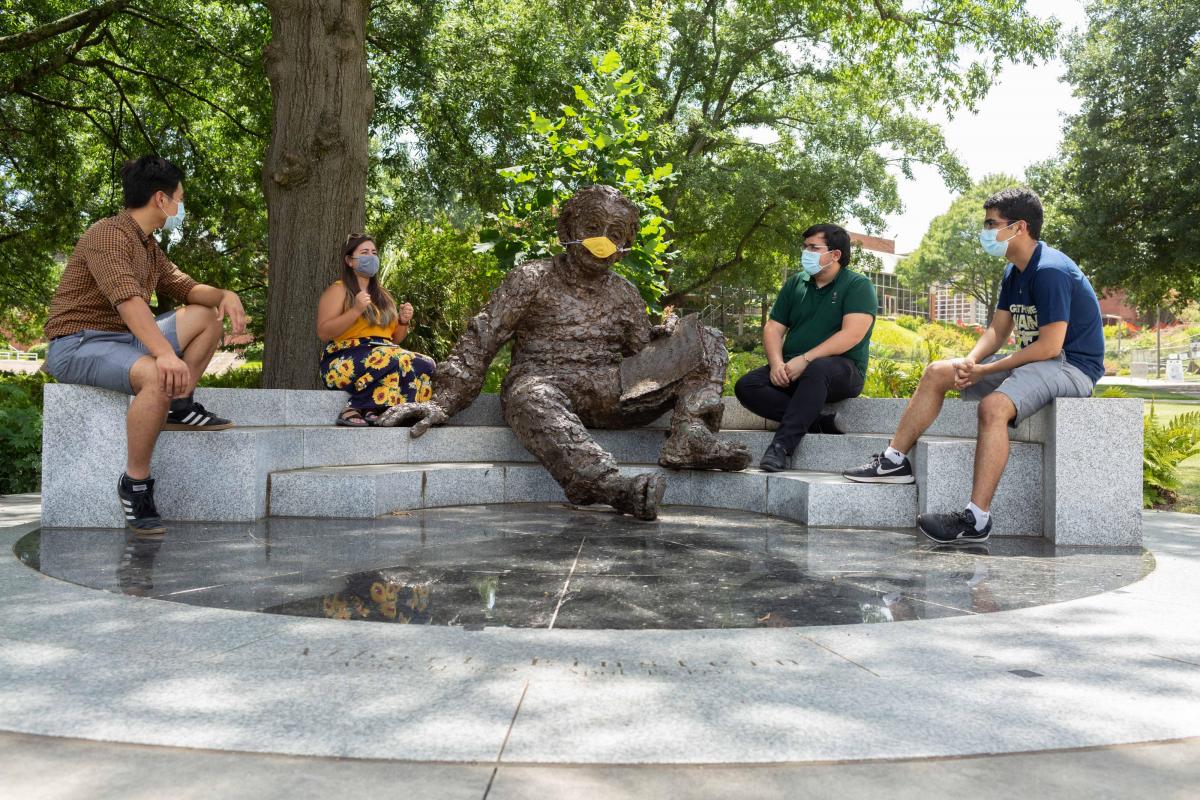 Students with the Einstein statue, photo